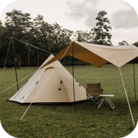 Cream-colored tent with shade and lawn chair