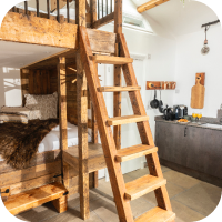 Bunk beds with wooden ladder